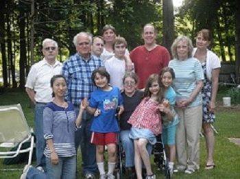 My family grouped in my mom's backyard in 2012. There are 12 of us.